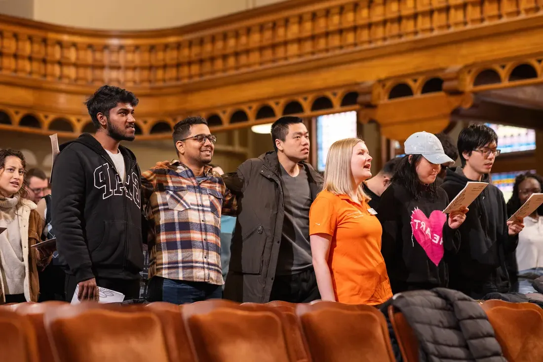 Students standing and singing.